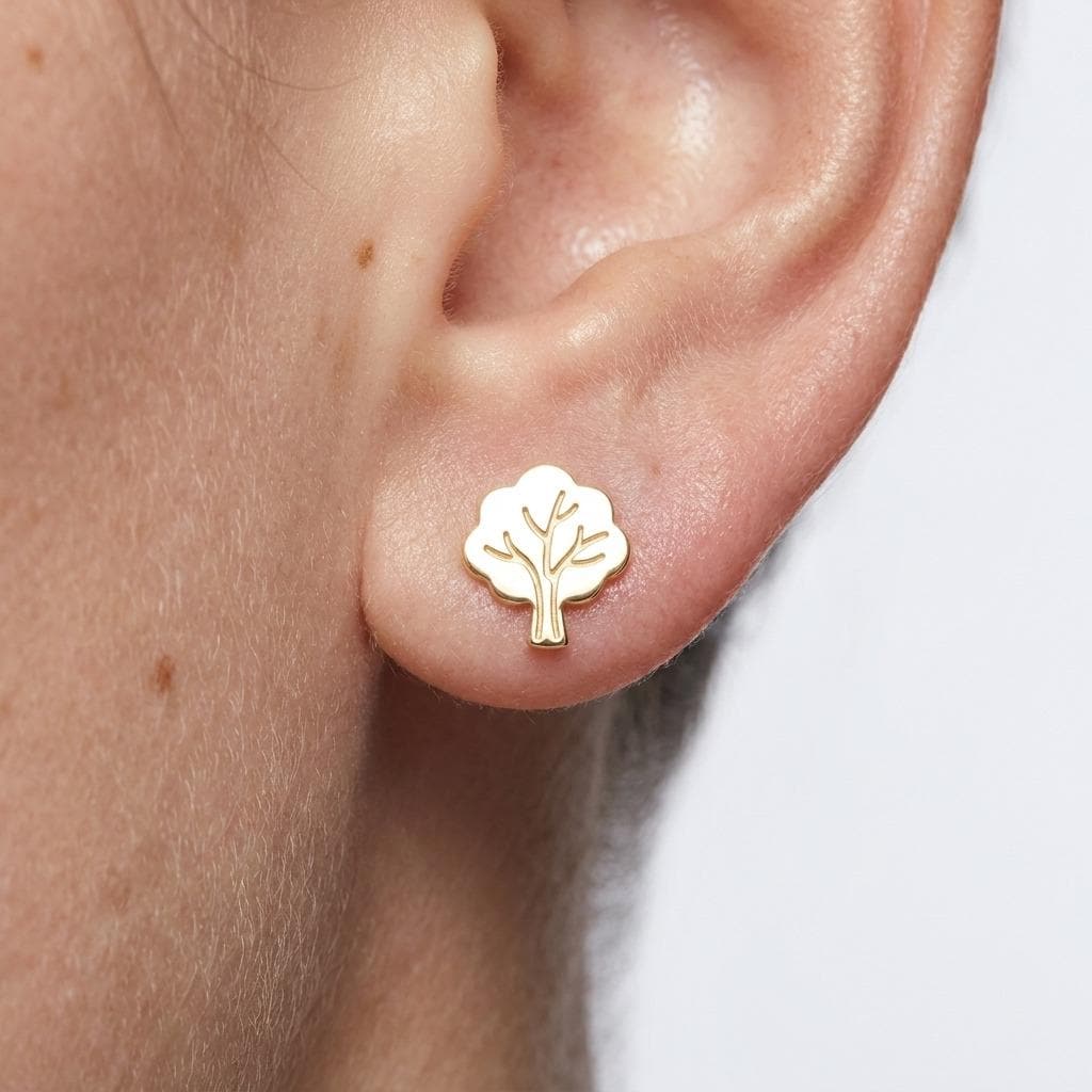 Pair of tiny gold tree stud earrings with a rounded canopy and short trunk (2 of 5)