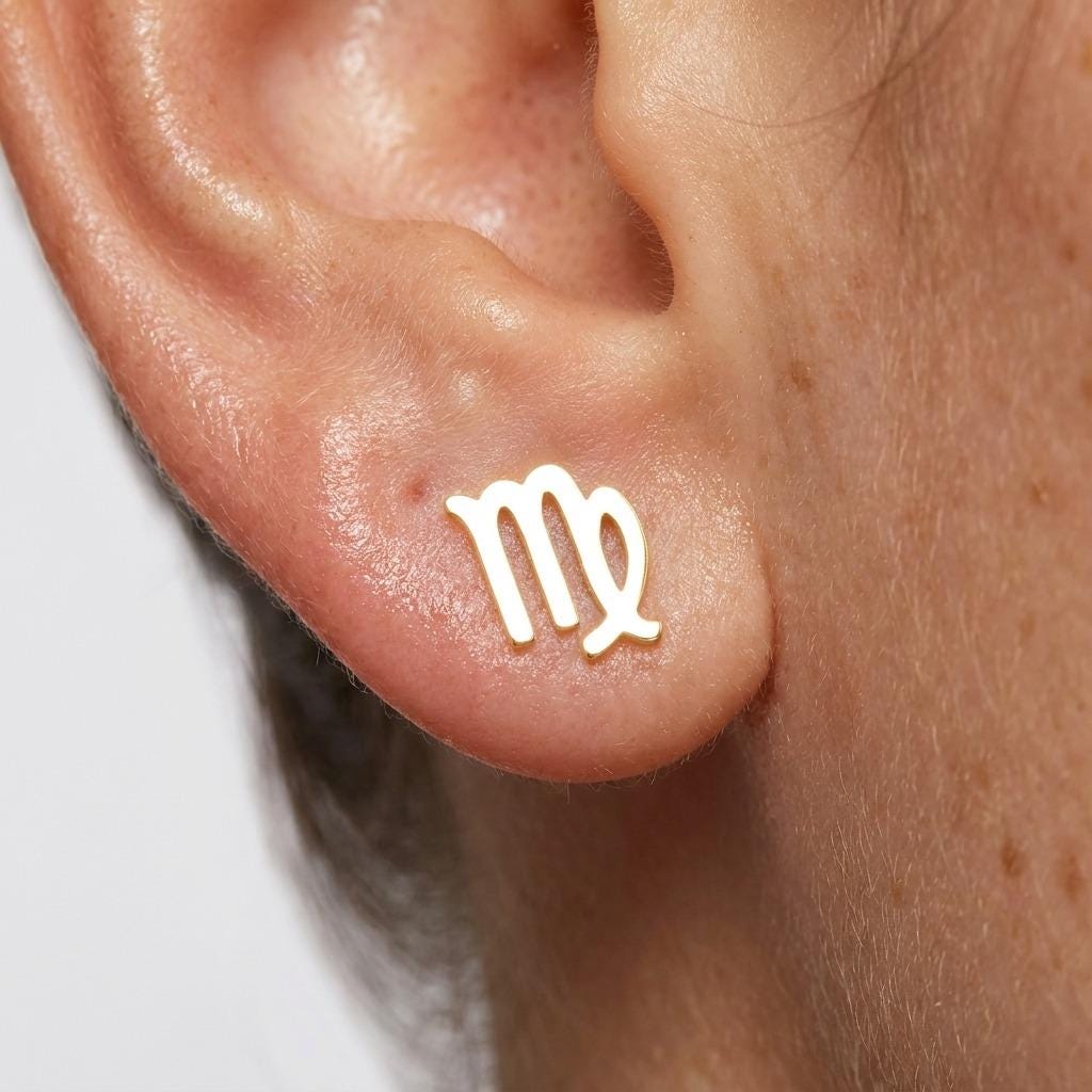 Pair of tiny zodiac sign glyph stud earrings in gold (2 of 14)