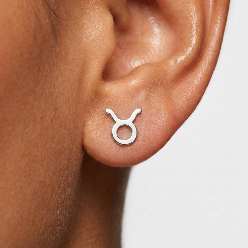 Pair of tiny zodiac sign glyph stud earrings in gold (7 of 14)