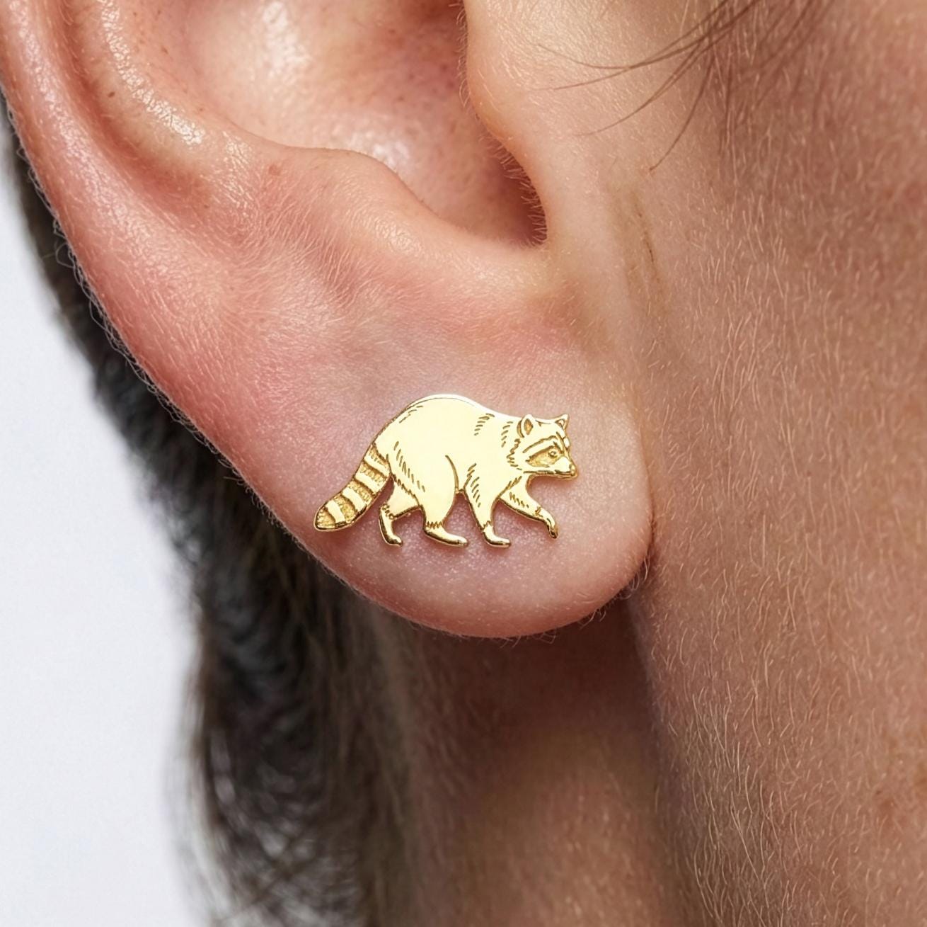 Pair of small gold raccoon stud earrings with masked face and ringed tail (2 of 5)