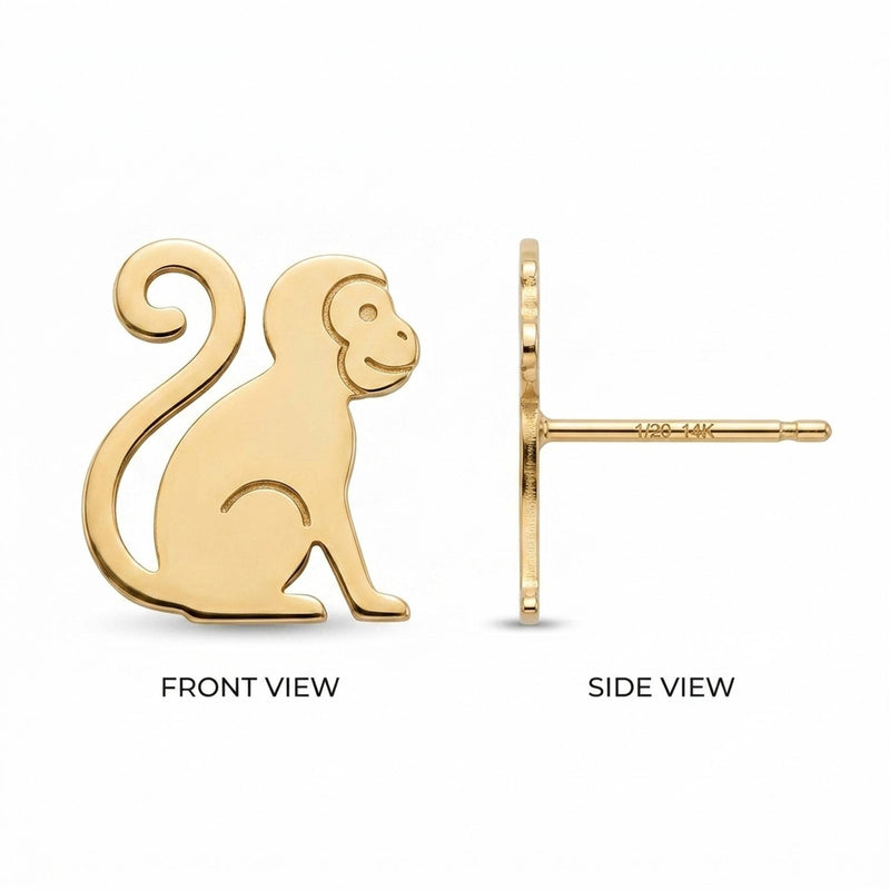 Pair of small gold monkey stud earrings with simple carved facial detail