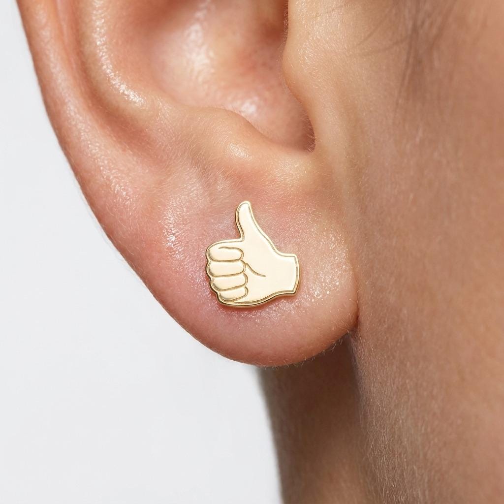 Pair of small gold thumbs up hand stud earrings (2 of 6)