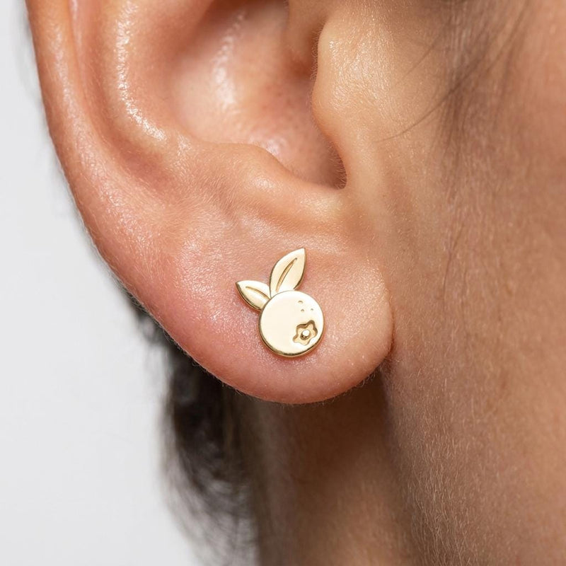 Pair of tiny gold blueberry stud earrings with star-shaped crown