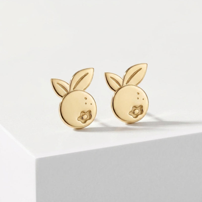 Pair of tiny gold blueberry stud earrings with star-shaped crown (2 of 5)