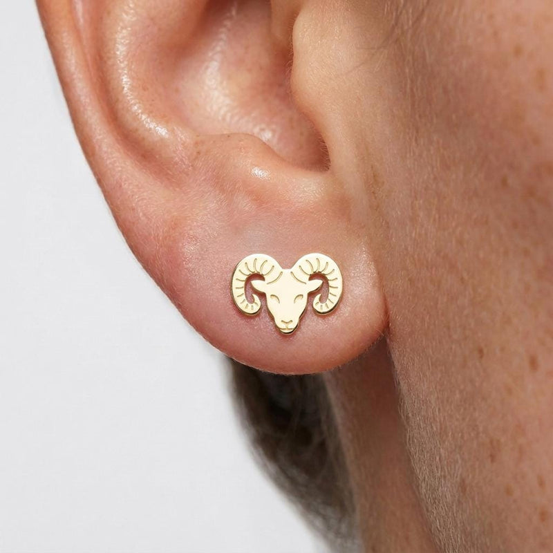 Pair of small gold ram head stud earrings with curled horns (2 of 5)