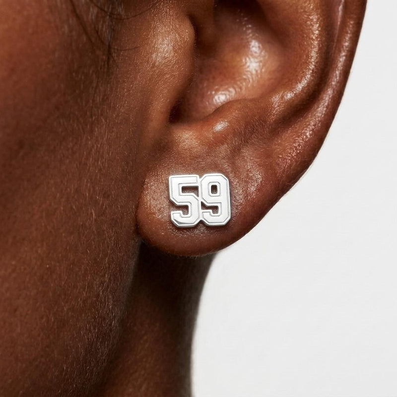 Pair of small gold sports jersey stud earrings with a number on the front (4 of 9)