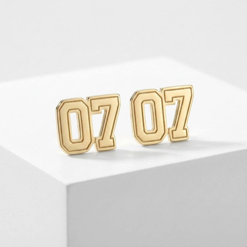 Pair of small gold sports jersey stud earrings with a number on the front (6 of 9)