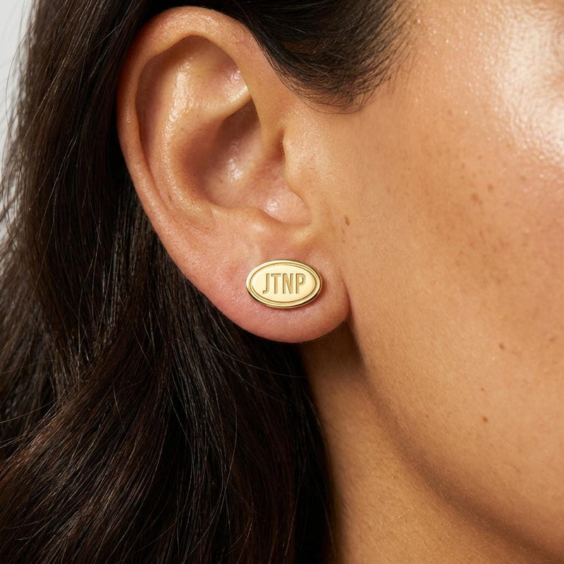 Pair of small gold oval stud earrings showing a Joshua tree and desert horizon (2 of 5)