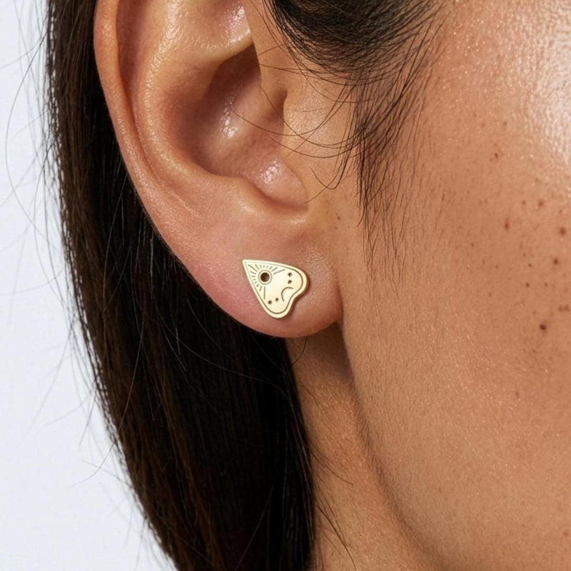 Pair of small gold planchette stud earrings with a round cutout window (2 of 10)