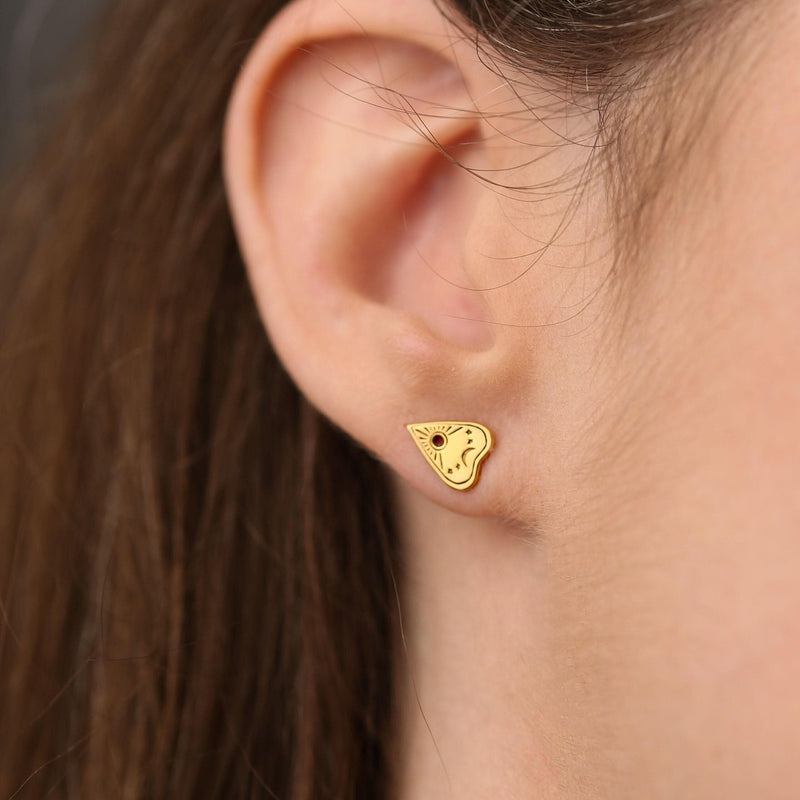 Pair of small gold planchette stud earrings with a round cutout window (6 of 10)