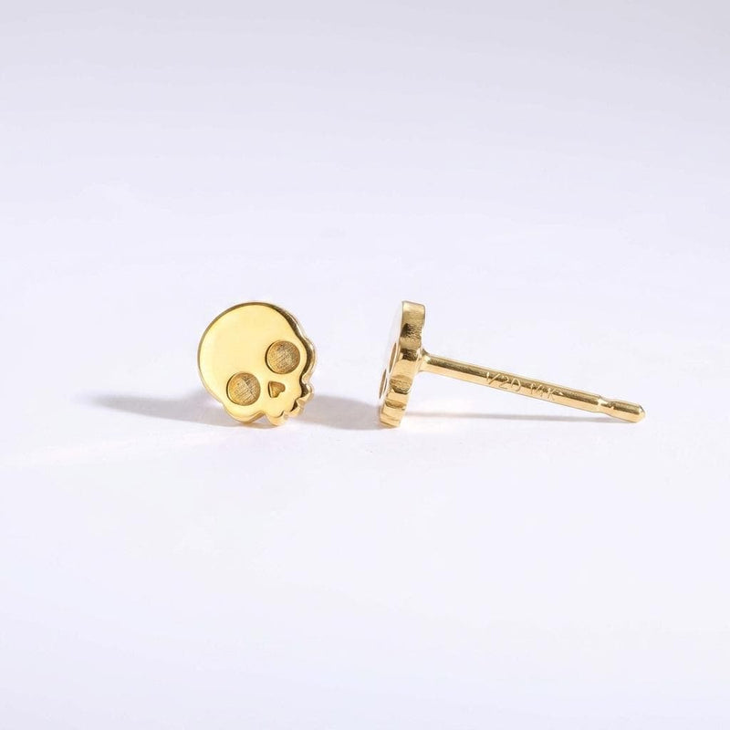 Pair of tiny gold skull stud earrings with round eye sockets (3 of 12)