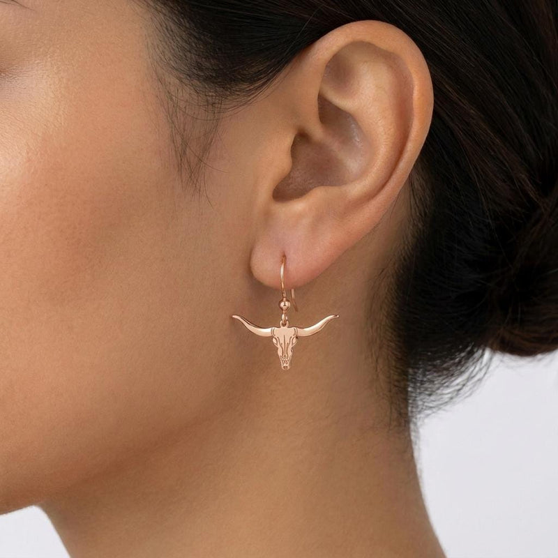 Pair of gold longhorn steer head stud earrings with wide curved horns (4 of 8)
