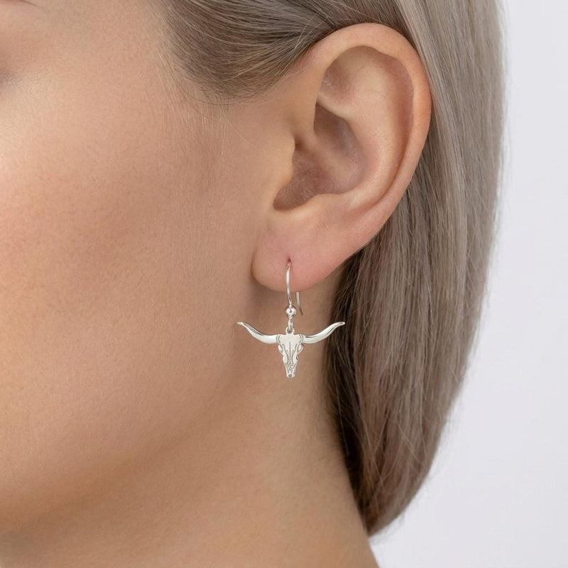 Pair of gold longhorn steer head stud earrings with wide curved horns (5 of 8)