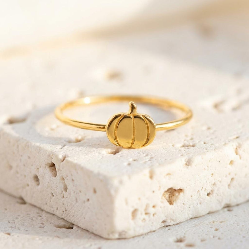 Thin gold ring topped with a small ribbed pumpkin charm with a curled stem (4 of 13)