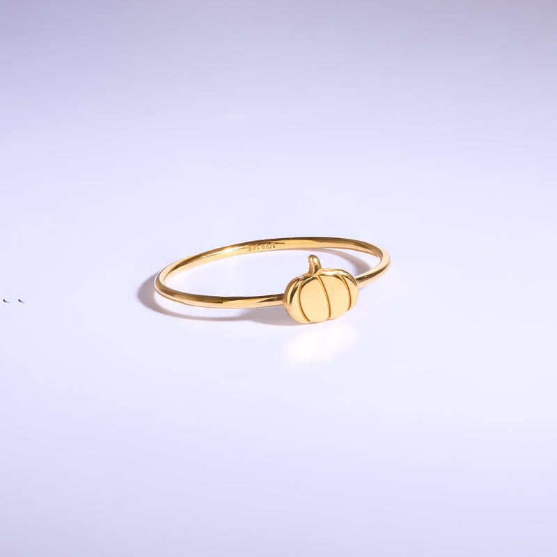 Thin gold ring topped with a small ribbed pumpkin charm with a curled stem (8 of 13)