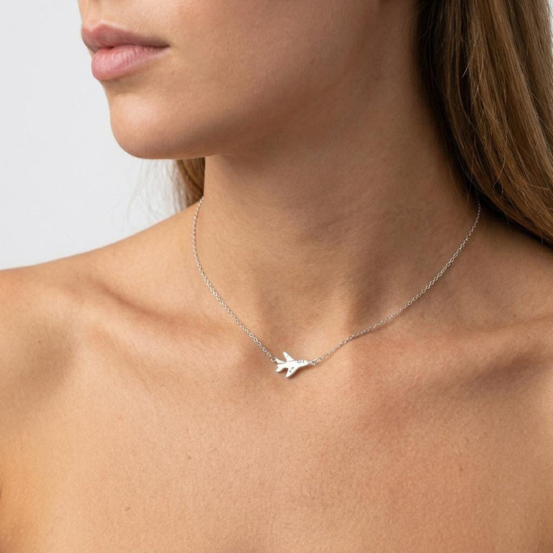 Small gold fighter jet pendant with swept wings on a fine cable necklace chain (3 of 7)