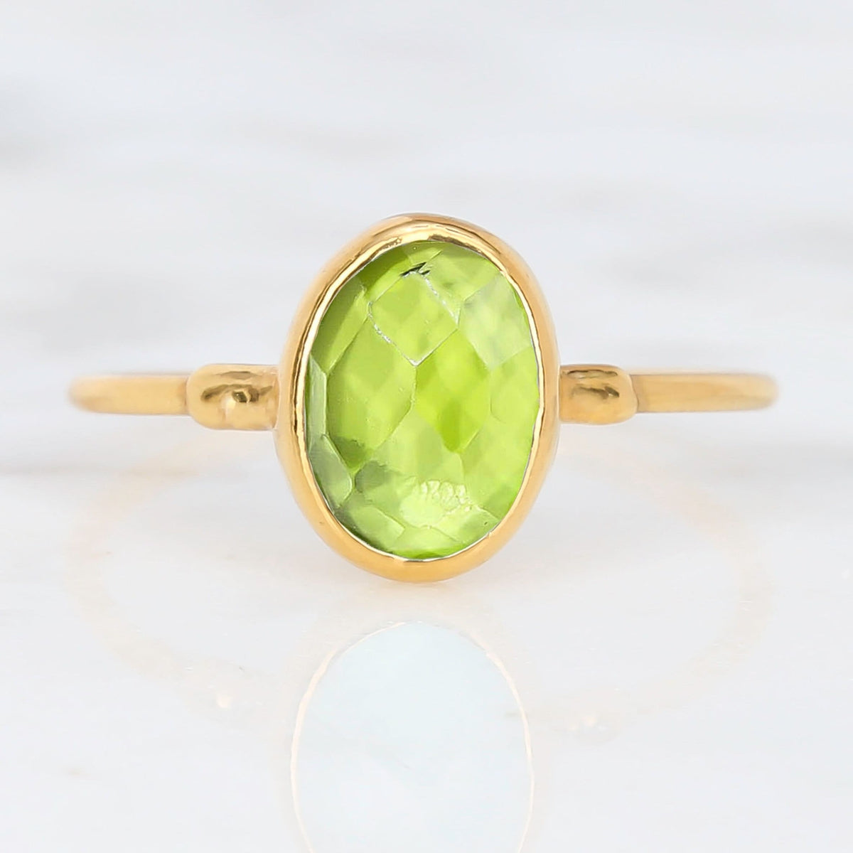 Raw Peridot Ring, 24k gold, photographed on white