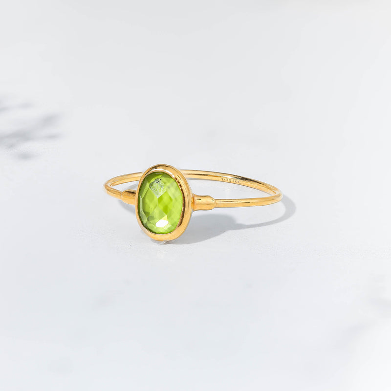 Raw Peridot Ring on a white background (7 of 14)