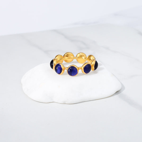 Eternity Cabochon Sapphire Ring on a white background