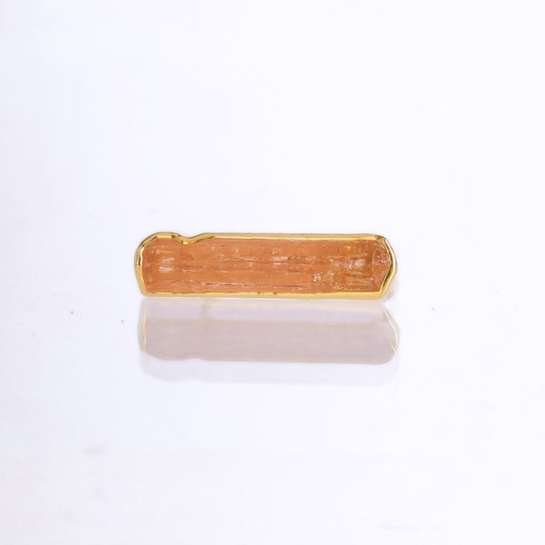 Raw Imperial Topaz Ring on a white background