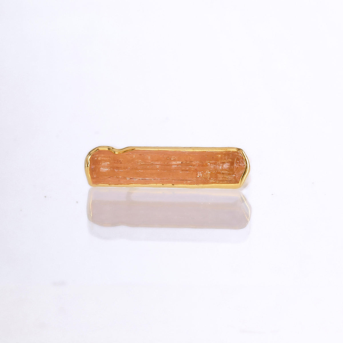 Raw Imperial Topaz Ring, 24k gold, photographed on white