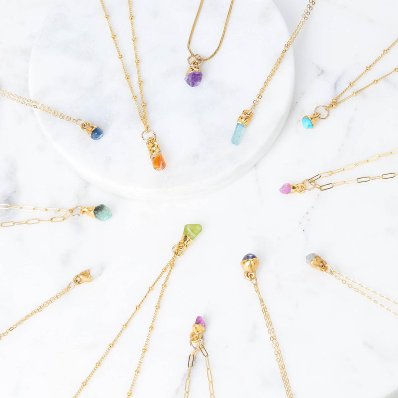 Raw Rose Quartz Necklace on a white background (8 of 13)
