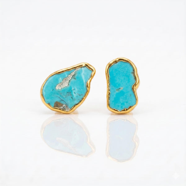 Raw Turquoise Earrings on a white background