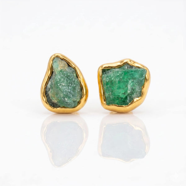 Raw Emerald Earrings on a white background