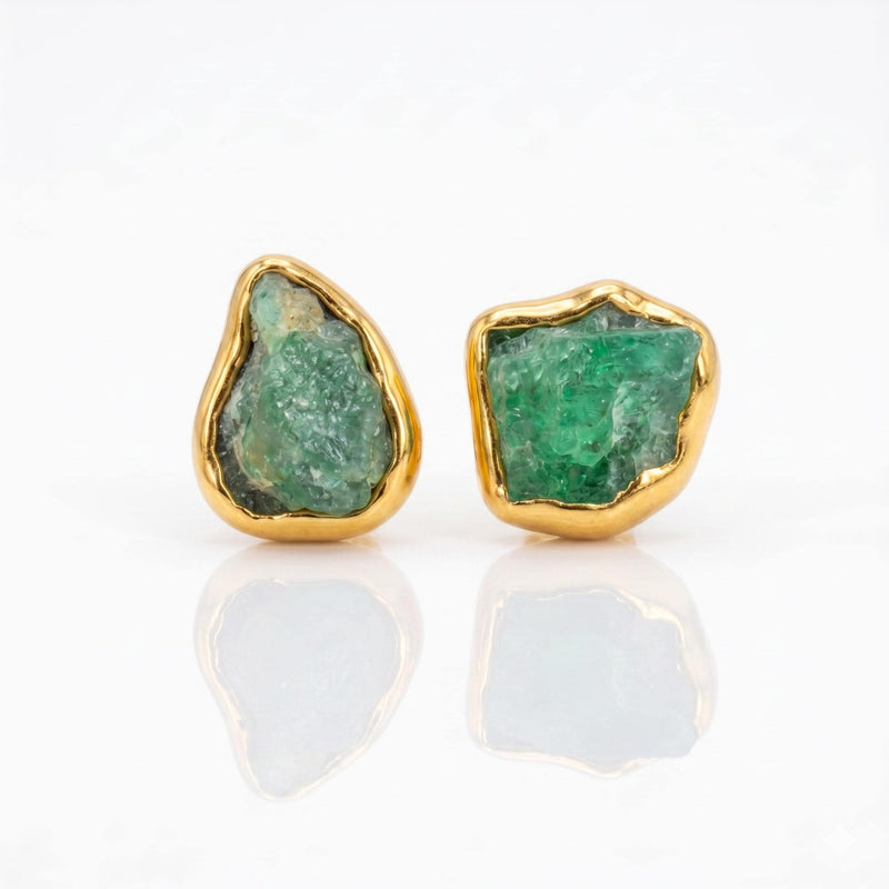 Raw Emerald Earrings on a white background