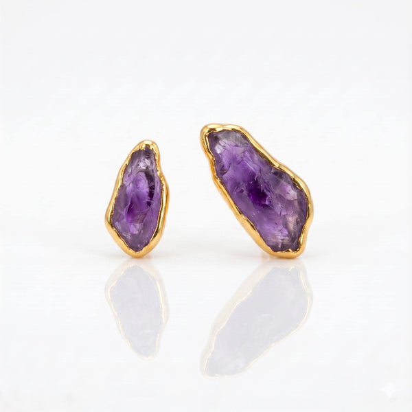 Raw Amethyst Stud Earrings on a white background