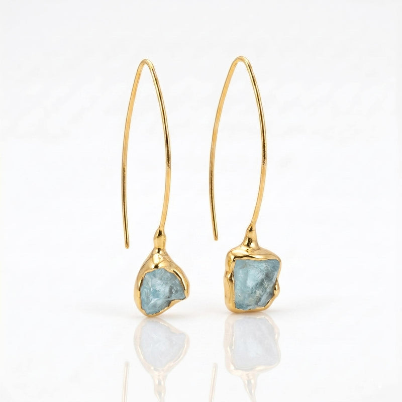 Raw Aquamarine Earrings on a white background
